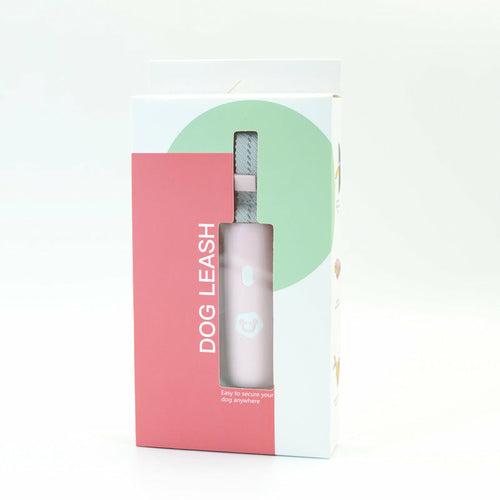 Dog leash packaging with pink and green design on a white background
