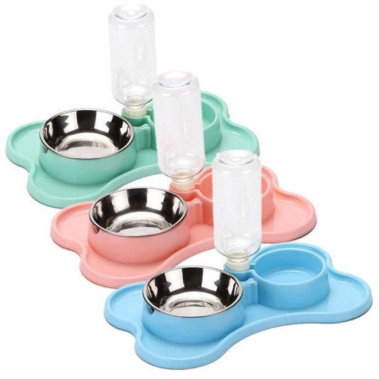 Set of three colorful pet feeding stations with bowls and water bottles on a white background